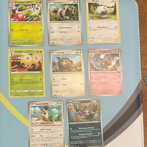 Pokemon Trading Card Set - Green, Yellow, Pink, Blue